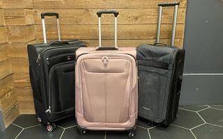 What should I do if my checked luggage bursts open during transit?